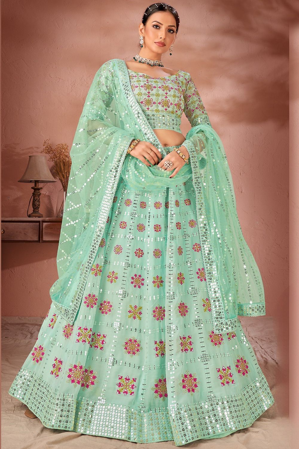 Sea Green Lehenga Choli With Butti Work in Net