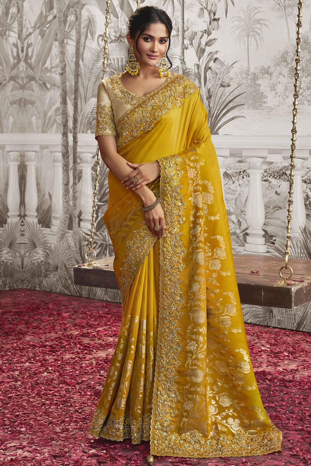 Yellow Heavy Embroidered Satin Saree With Embellishment