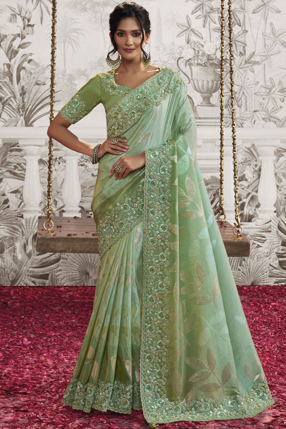Light Green Heavy Embroidered Satin Saree With Embelishment