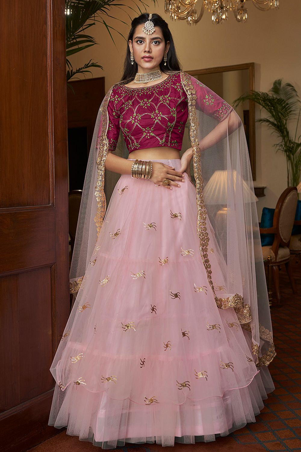 Baby Pink Embroidered Flared Net Lehenga